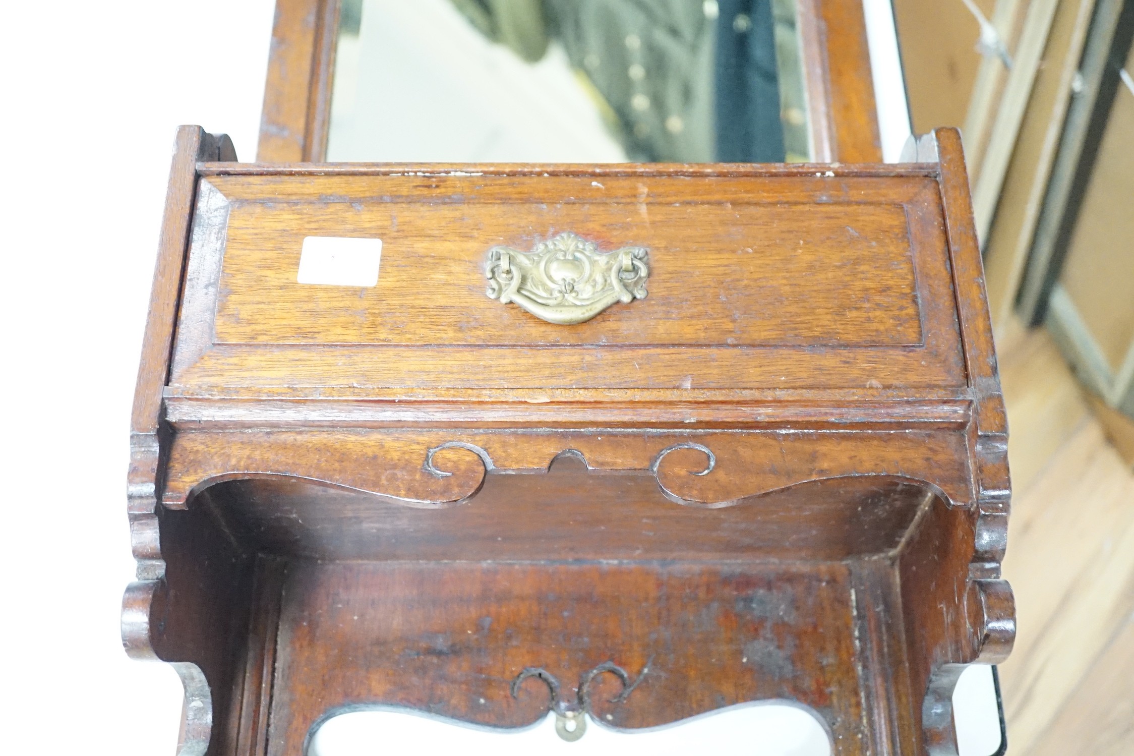 A Victorian walnut single drawer hanging mirror, 77cms high